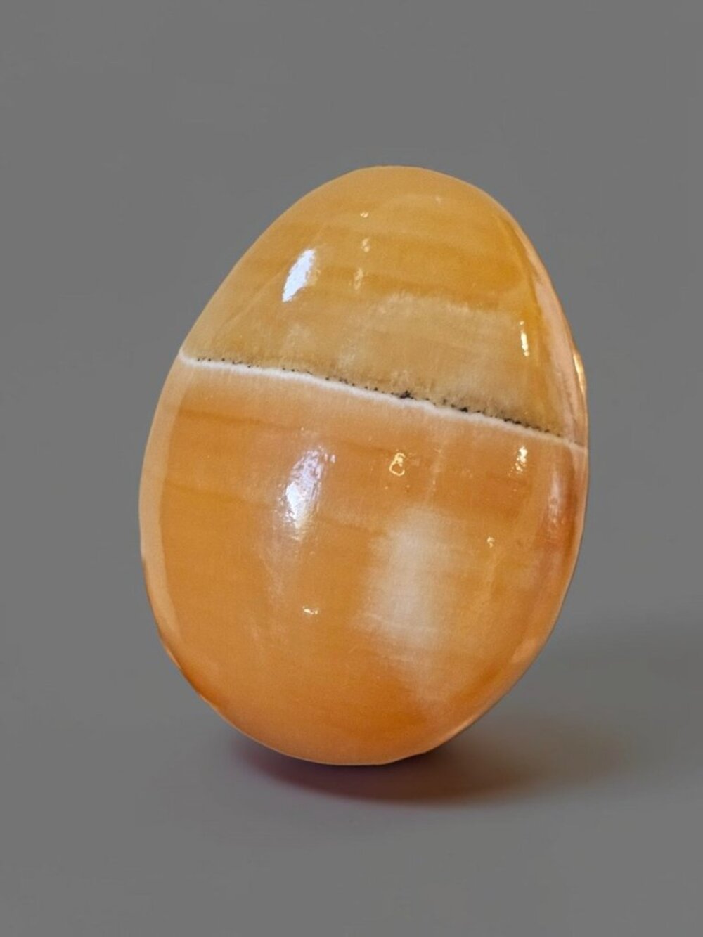 Polished Honey Calcite Onyx Marble Egg 2.75" Orange Cream Banded Stone Decor